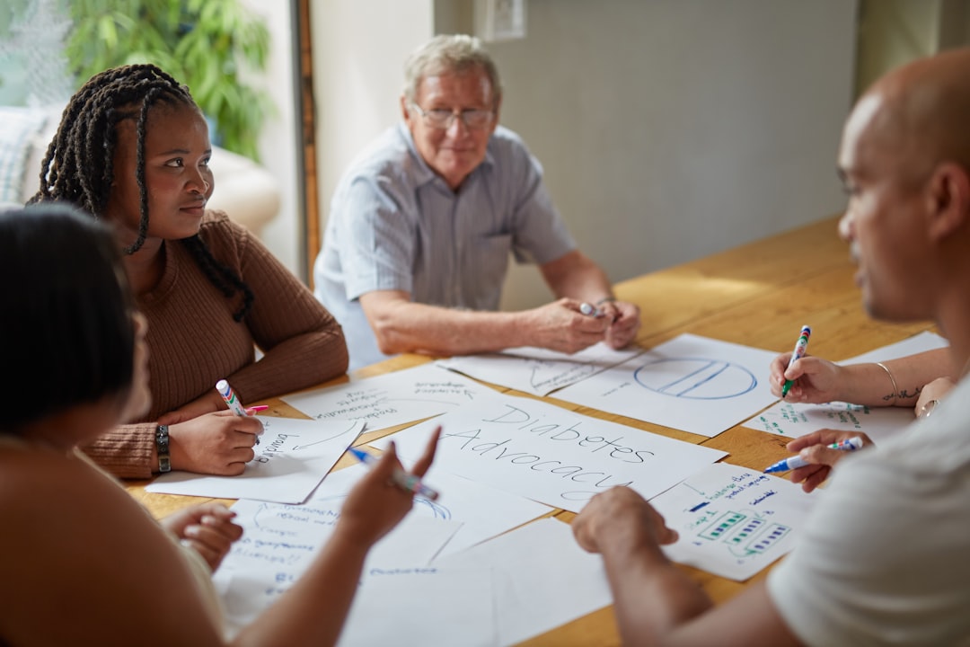 People are working together at a meeting