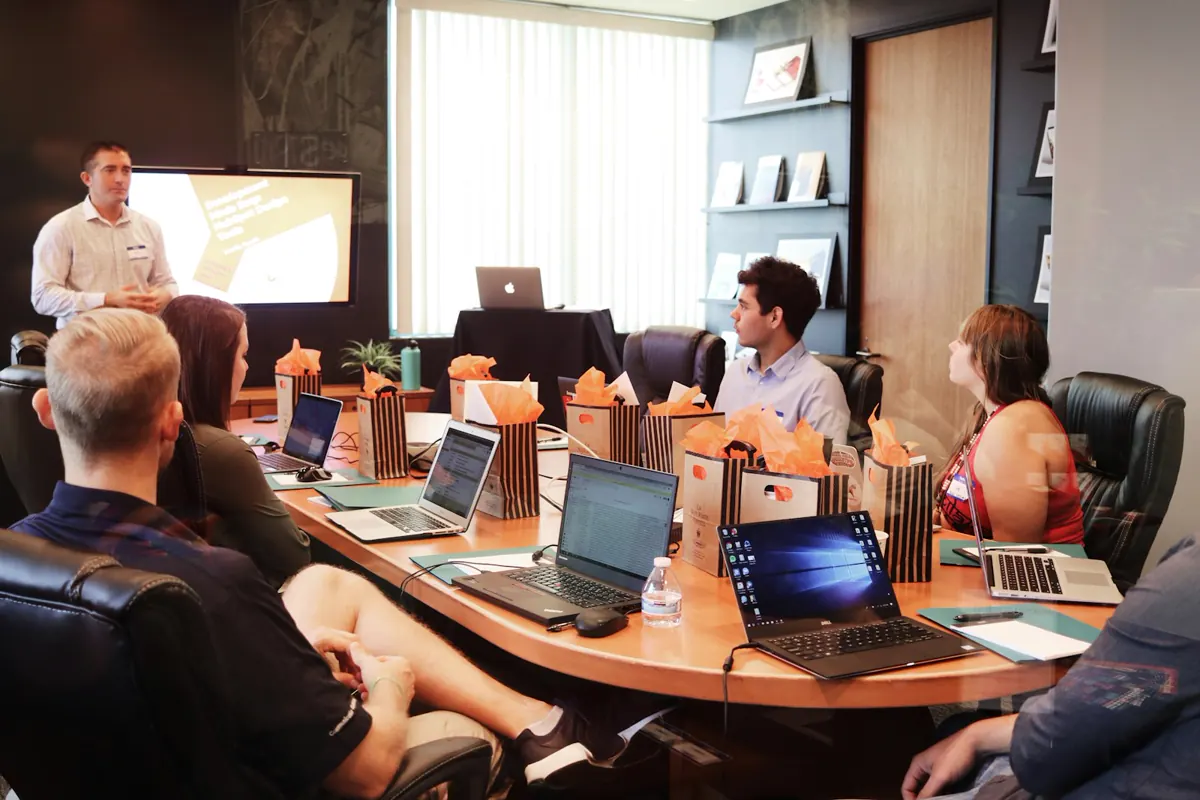Marketing strategy session reviewing website audit and AI search visibility data